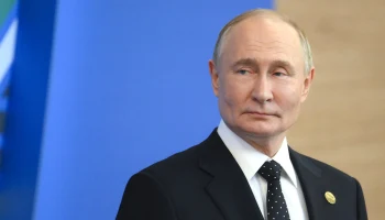 Эксперты увидели сигнал для Путина в галстуке эмира Катара