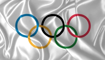 Глава МОК назвала успешным опыт допуска россиян до ОИ в ответ на нападки украинца