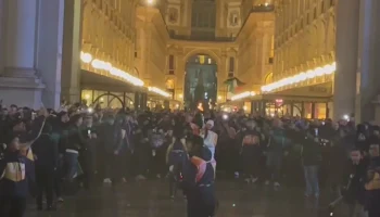 Церемония встречи олимпийского огня прошла в Милане